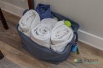 Dog towels, linens, potty bags, and bowls.
